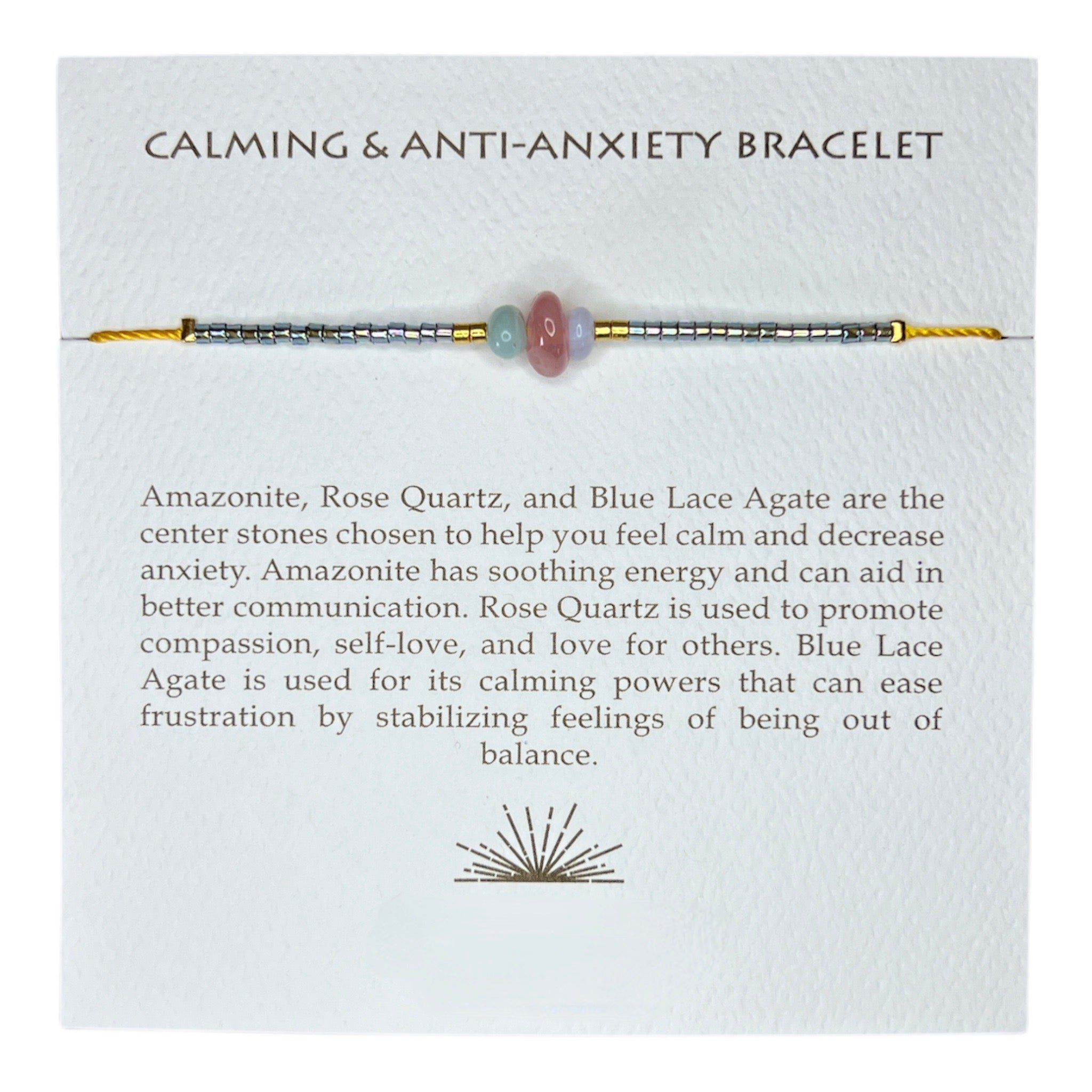 This calming + anti-anxiety bracelet holds iridescent beads and chosen stones on an adjustable gold thread.