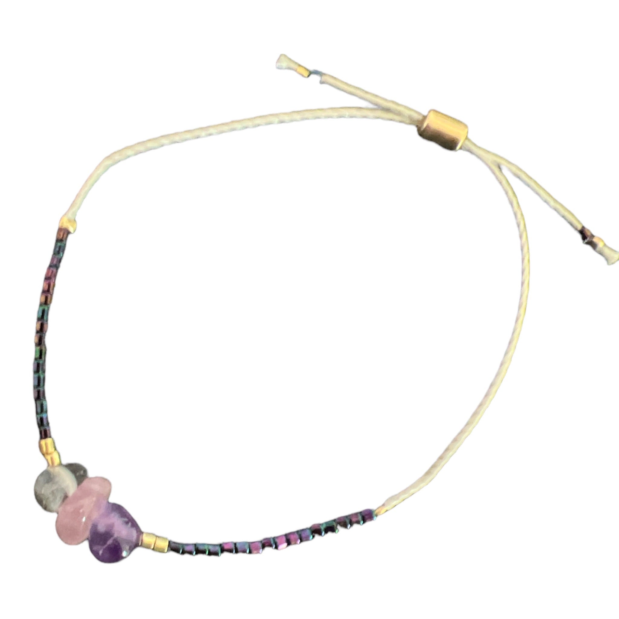 love + happiness iridescent purple beaded bracelet