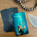 The Light Seer's Tarot Deck reimagines the traditional tarot symbols and archetypes in a contemporary, boho style.