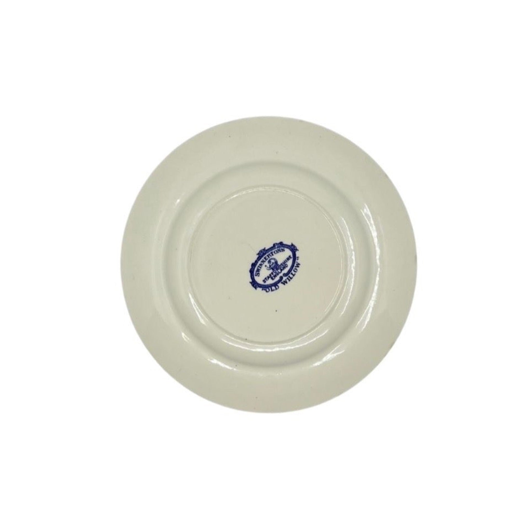 Antique vintage blue plates have been given new life with hand-painted evil eyes. Just the thing we need that we didn't even know we needed.