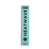 A tall, narrow mint-green box for Grass Earth Heatwave incense sticks, featuring bold black text and a sun graphic, set against a white background.