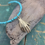 Turquoise Beaded Necklace with Brass Hand