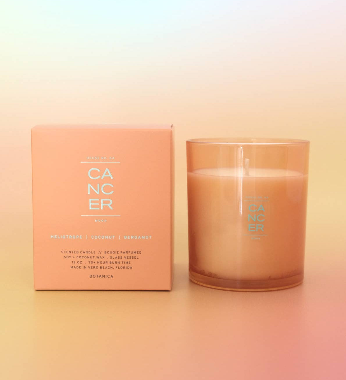 Candle and packaging with 'Cancer' text on a gradient background