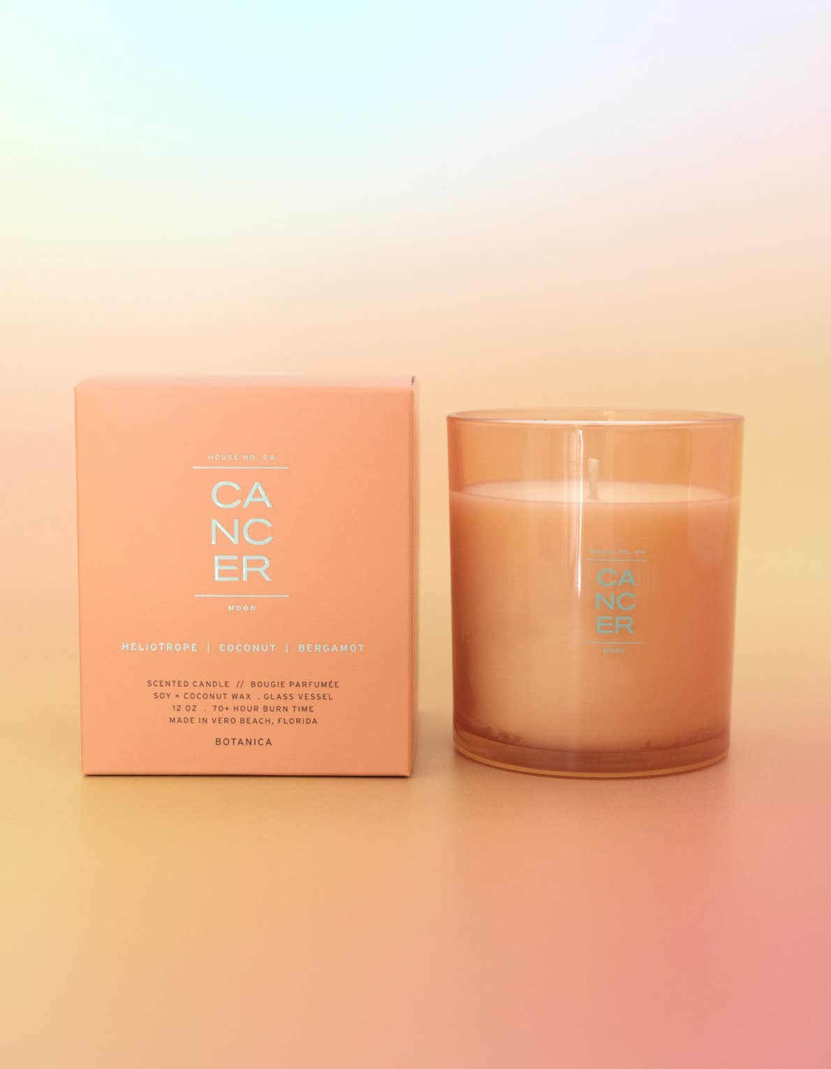 Candle and packaging with 'Cancer' text on a gradient background
