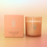 Candle and packaging with 'Cancer' text on a gradient background