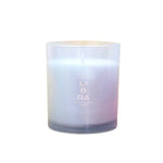 A frosted glass jar candle with white wax and a single wick, featuring the text 'LIBRA' printed on the front, set against a white background.