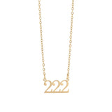Gold necklace with '222' pendant on a white background