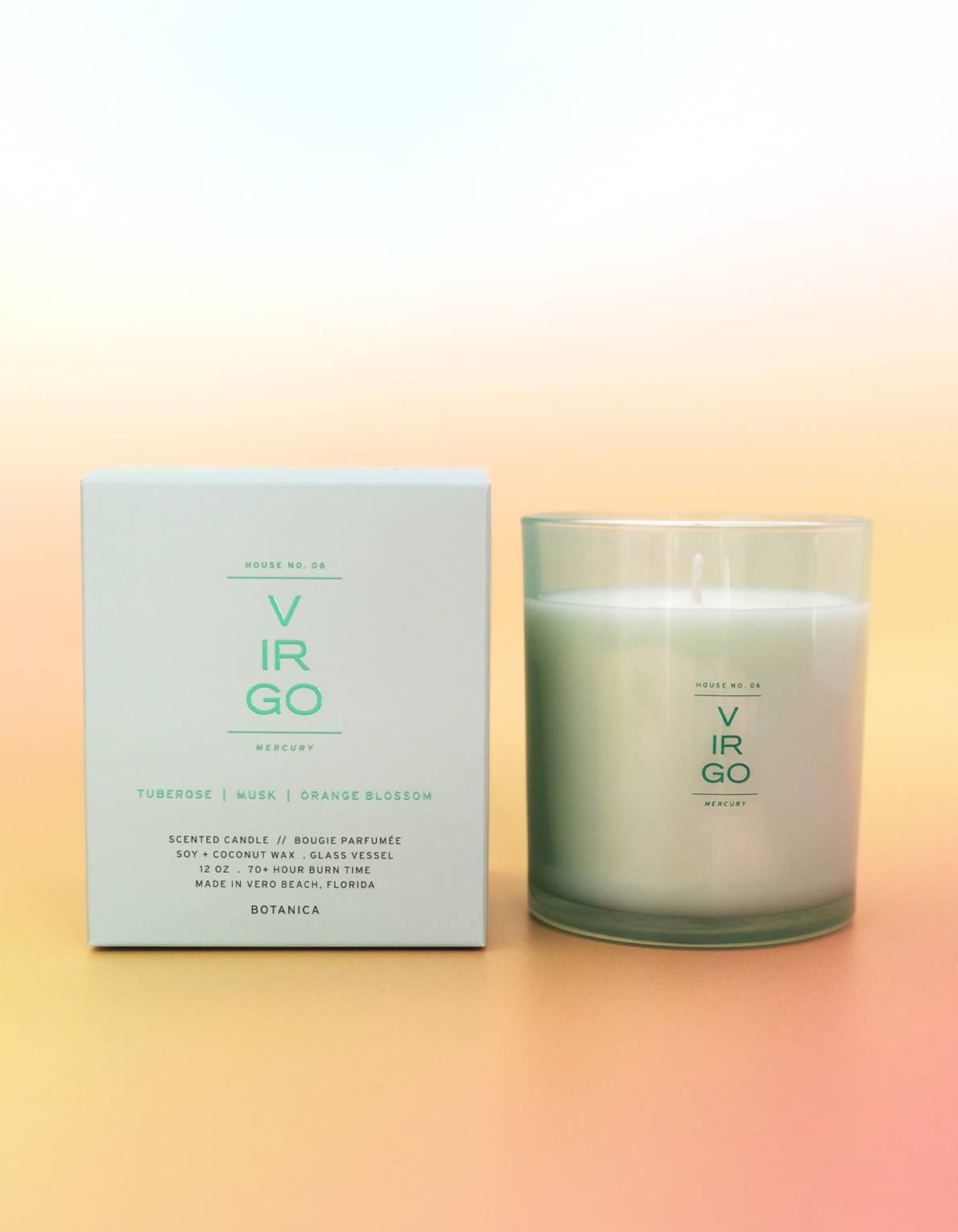 Candle and packaging with 'Virgo' branding on a gradient background