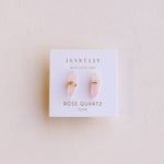 Jax Kelley rose quartz earrings on a branded card against a light background