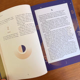 Open book on a wood surface