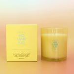 Candle and its packaging with 'Aquarius' branding on a gradient background