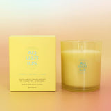 Candle and its packaging with 'Aquarius' branding on a gradient background