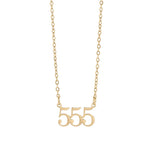 Gold necklace with '555' pendant on a white background