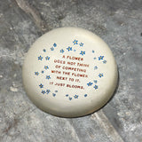 X A Flower Just Blooms Paperweight