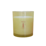 Candle in a yellow glass jar with 'LEO' text in hot pink on a white background