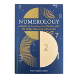 Blue book cover with Numerology: A Guide to Decoding Your Destiny with the Hidden Meaning of Numbers on a white background.