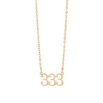 Gold necklace with '333' pendant on a white background