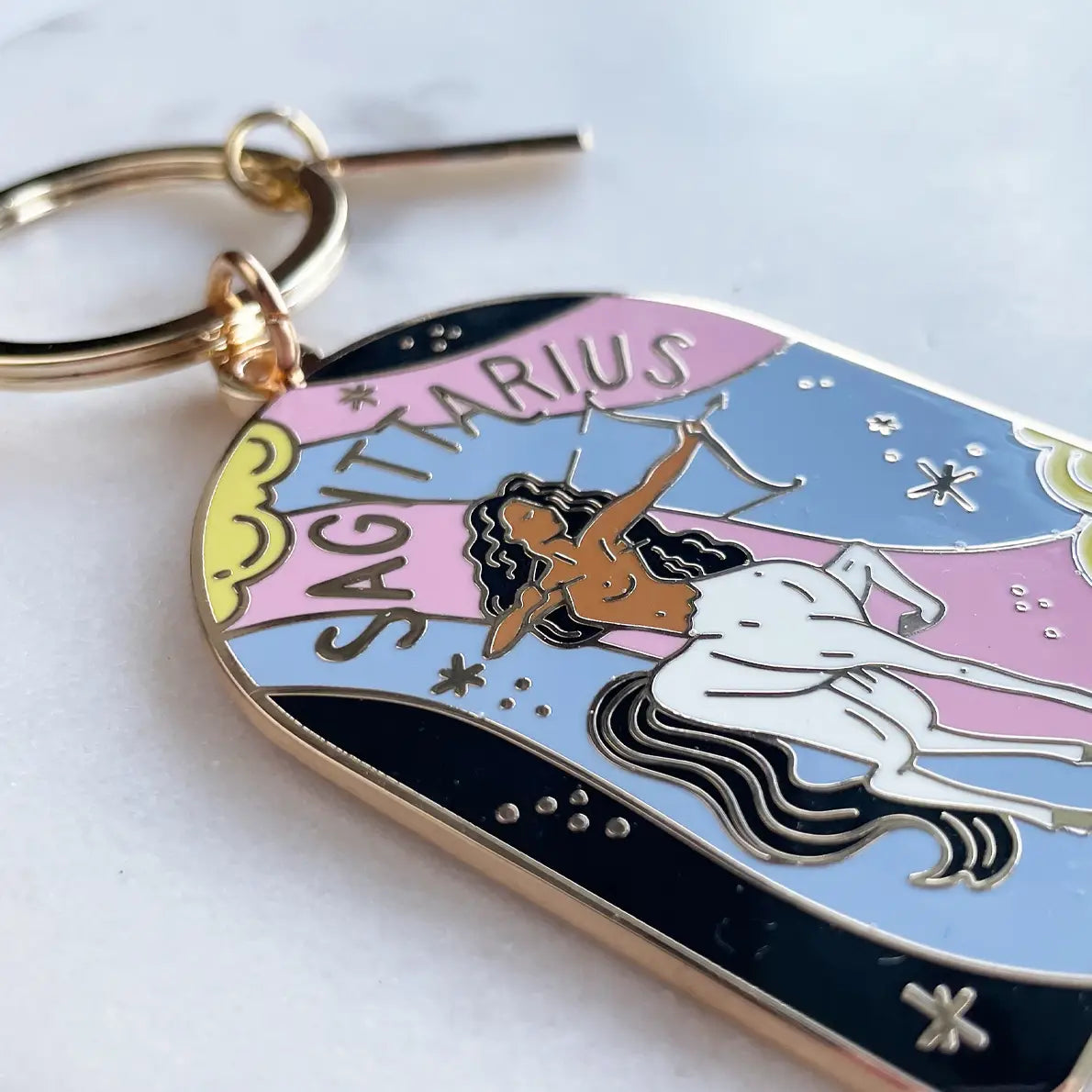 Sagittarius zodiac keychain on a white background