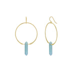 Gold hoop earrings with blue cylindrical drops on a white background