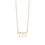 Gold necklace with the number '777' on a white background