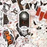 Collection of tarot card illustrations with various designs and text.