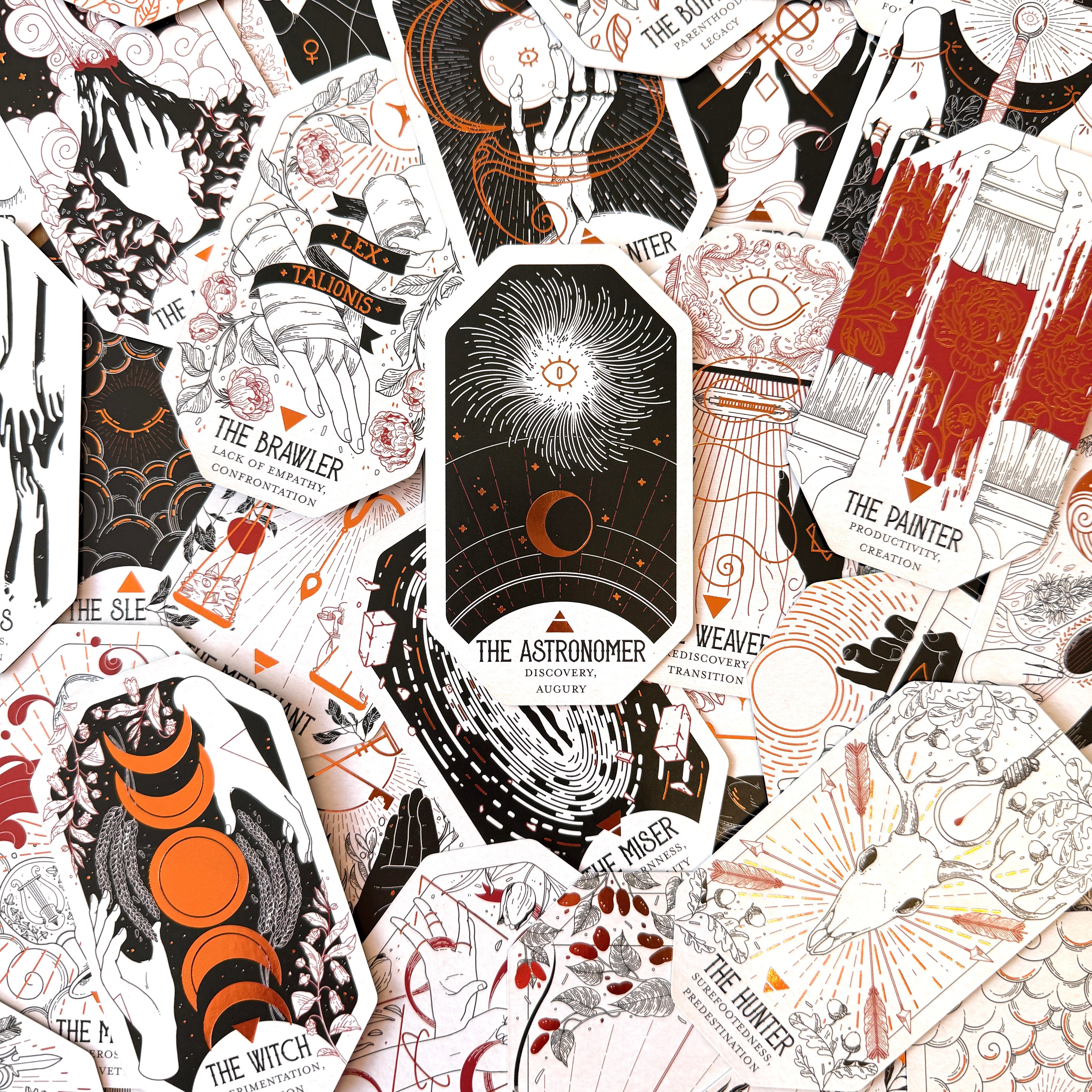 Collection of tarot card illustrations with various designs and text.