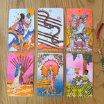 Set of tarot cards on a wooden surface
