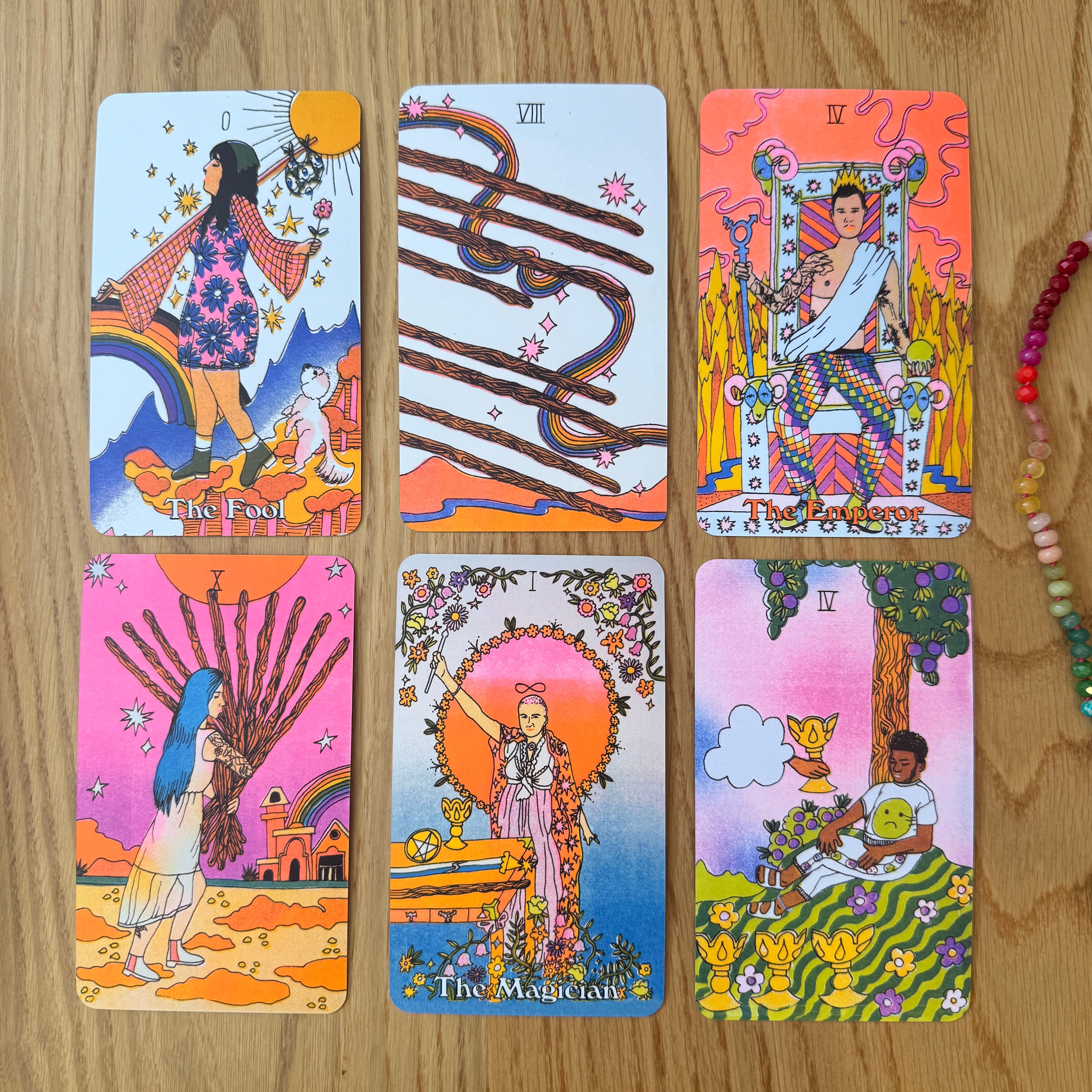 Set of tarot cards on a wooden surface
