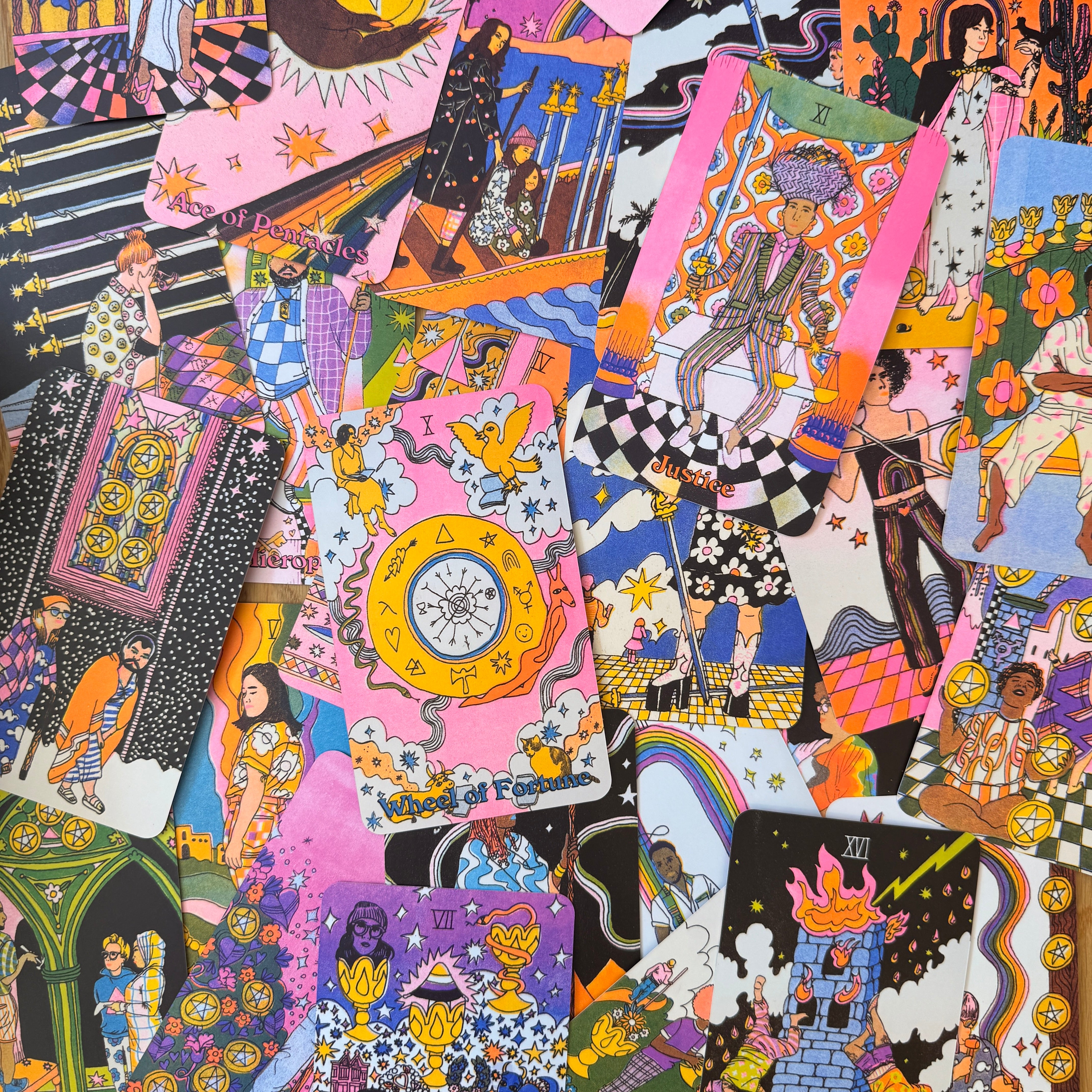 Colorful tarot card collage with various designs and characters.