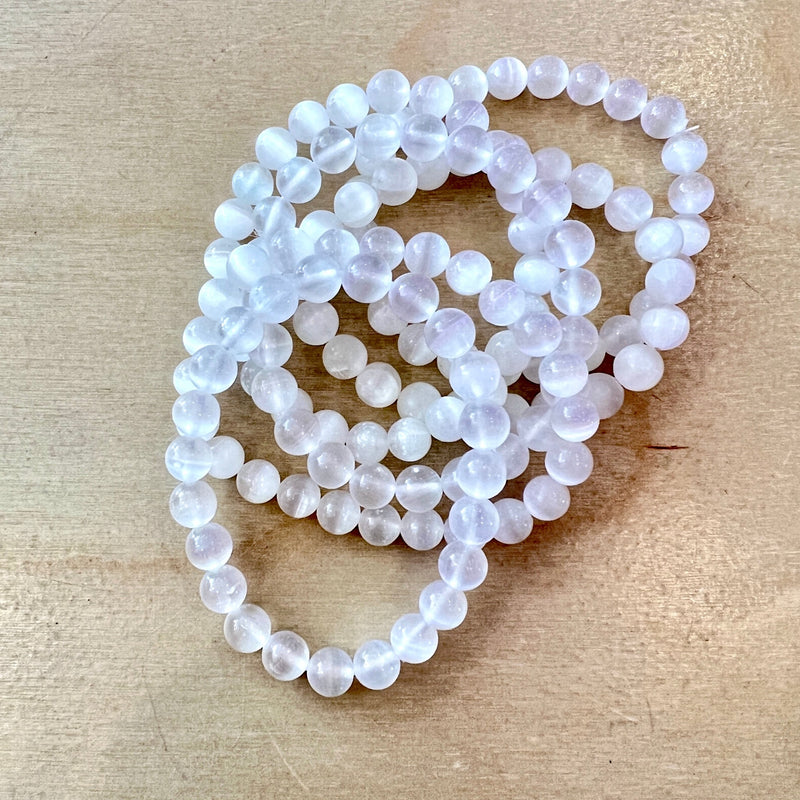 Let its gentle shimmy of a white surface do the healing and cleansing with this Selenite bracelet.