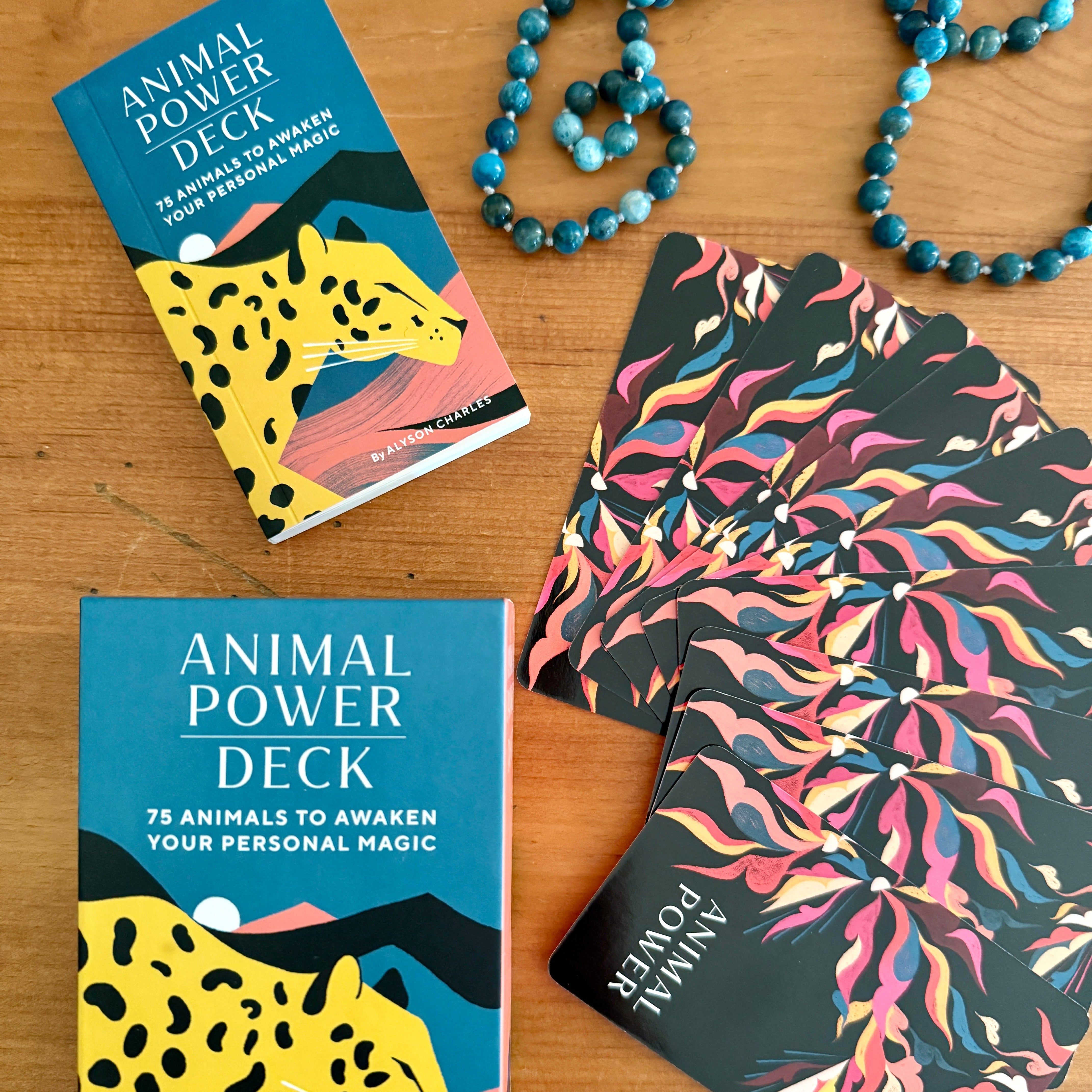 Animal Power Deck with cards and packaging on a wooden surface