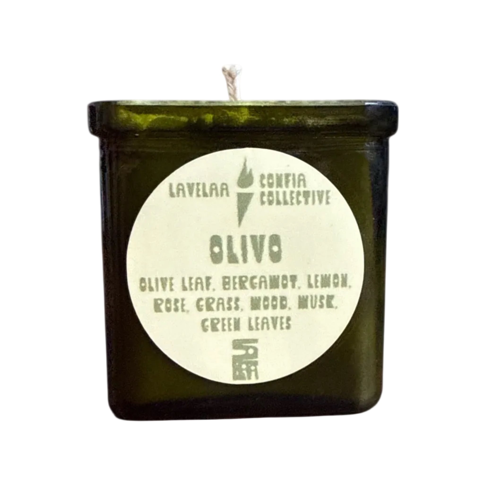 Green candle in a glass container with a label on a white background