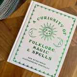A Curiosity of Folklore, Magic and Spells Book - Confía Collective