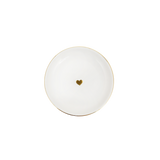 White ceramic round dish with gold heart in center