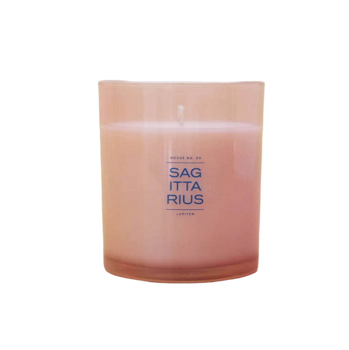 A pink glass jar candle with a single wick, featuring the text 'SAGITTARIUS' in blue on the front, set against a white background.