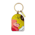 Keychain with Leo zodiac design on a white surface