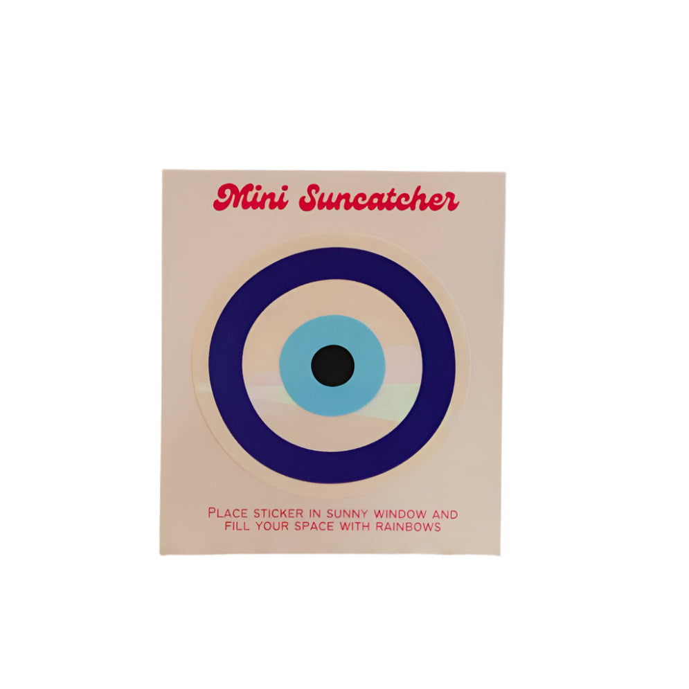 Mini suncatcher packaging with circular design on a blurred background