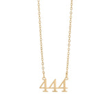 Gold necklace with '444' pendant on a white background