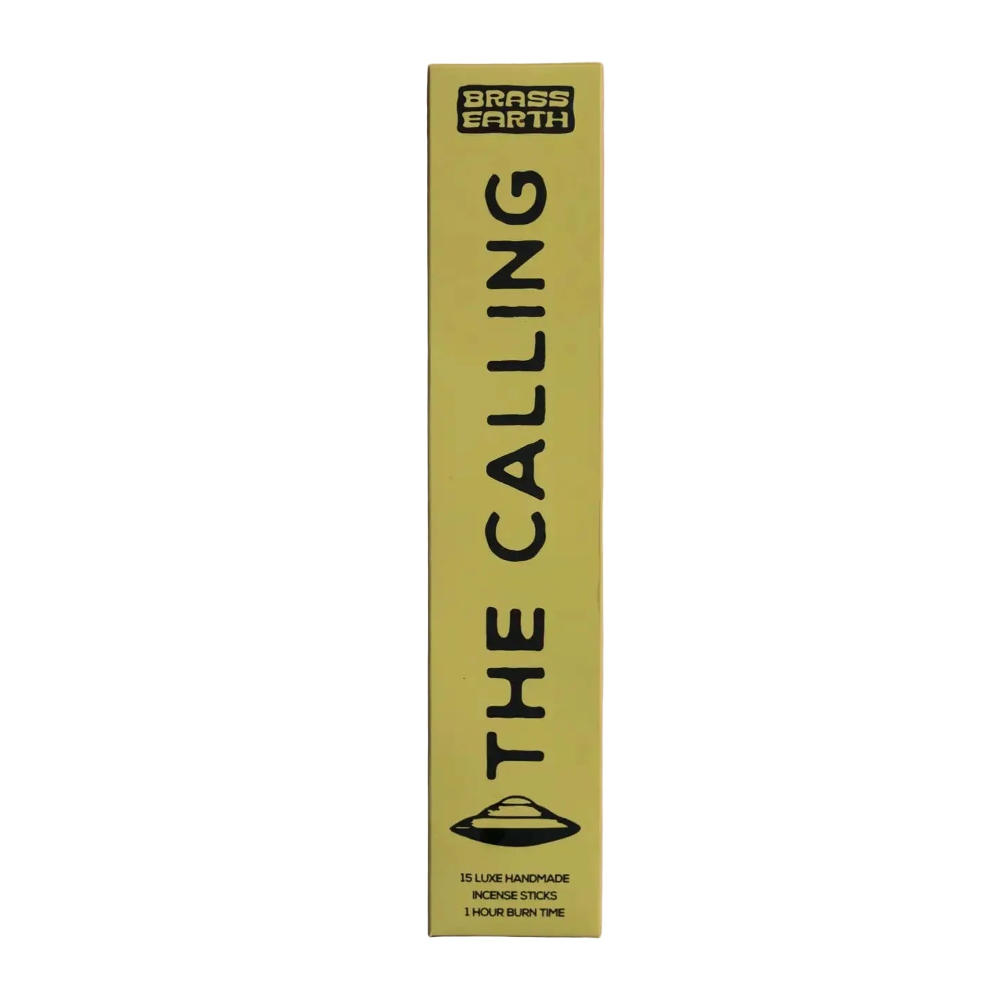 A tall, narrow yellow-green box for Brass Earth incense stands vertically against a soft pink background. The box is printed with the words 'THE CALLING' in large black letters and a small UFO-style graphic near the bottom.