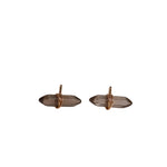 Pair of smoky quartz earrings with rose gold settings on a light gray background