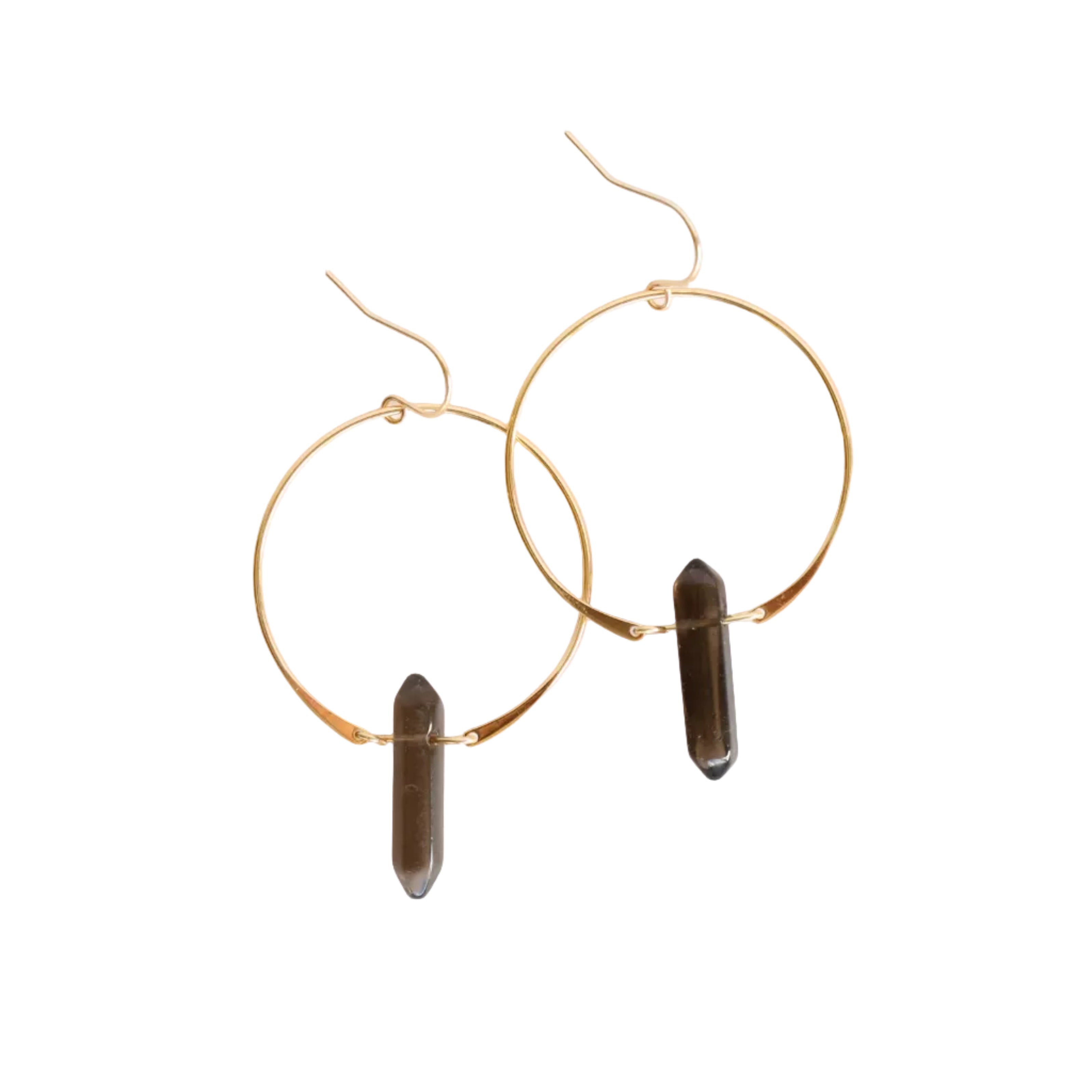 Gold hoop earrings with dark cylindrical beads on a white background