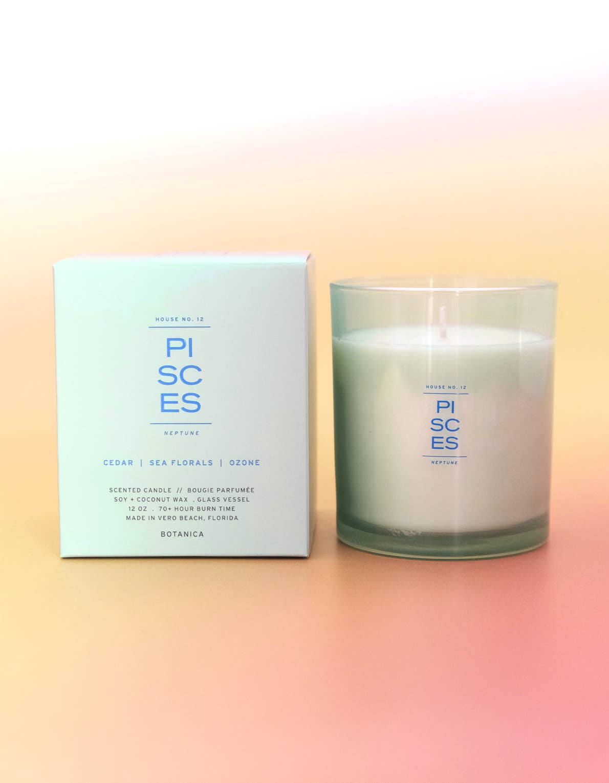 Pisces candle and packaging on a gradient background