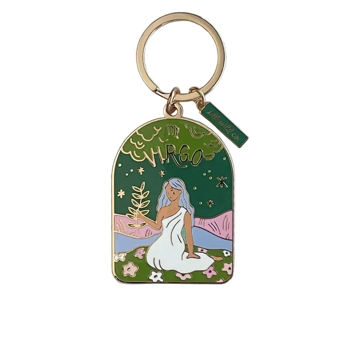 Colorful brass VIRGO keychain with a woman sitting on a white background
