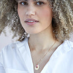 Model with white shirt wearing  Gold  Birthstone Gold "healing" Necklace - Confía Collective