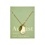 August Gold Birthstone Peridot Necklace on green card- Confía Collective