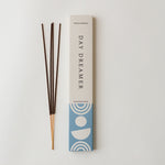 Day dreamer incense for tranquility with the soothing scents of peony, linen, sandalwood, lavender, and citrus essential oils.