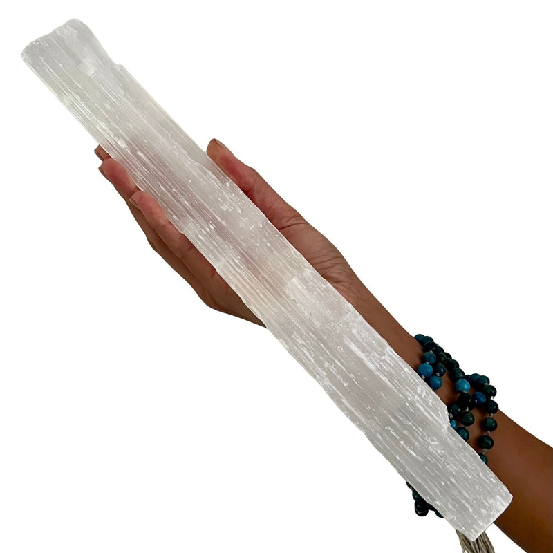 rough selenite wands imported from Morocco “Light from the heavens” cleansing • protection • spiritual growth • clarity chakras: crown Selenite is a transparent to translucent milky white form of gypsum with a luminous sheen. This long columnar crystal scratches easily with a fingernail. As the story goes, selenite is a piece of Heaven gifted by Selene, the Greek goddess of the Moon.