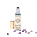 calming essential oil roll on aromatherapy with amethyst crystals.