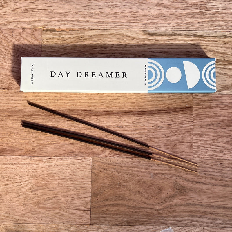 Day dreamer incense for tranquility with the soothing scents of peony, linen, sandalwood, lavender, and citrus essential oils.