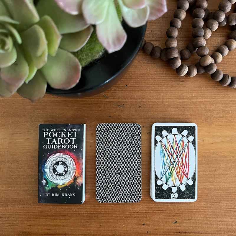 Each of the miniature 78 cards in The Wild Unknown Pocket Tarot Deck & Guidebook is a work of art that explores the mysteries of the natural world and the animal kingdom. 